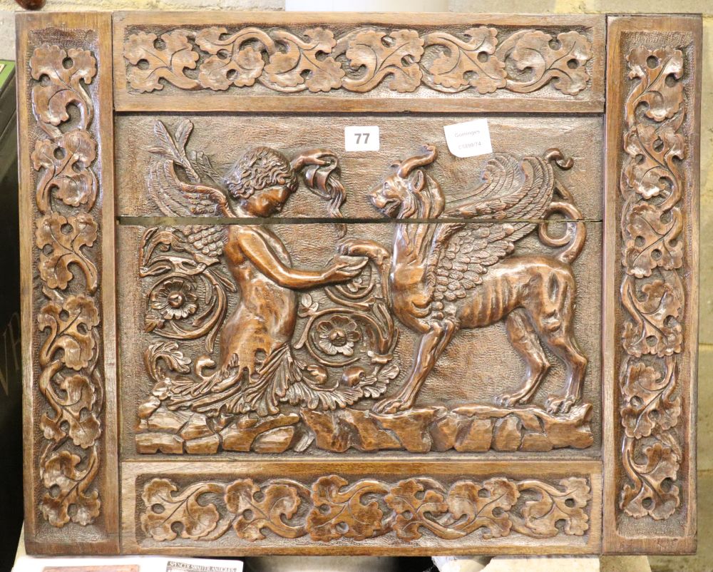 An Italian carved rectangular walnut panel, c.1920, W.62cm, H.50cm